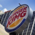 Burger King Worldwide Inc.’s share price up, negotiates a merger with Tim Hortons Inc.