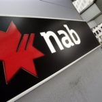 National Australia Bank share price up, forecasts a drop in full-year earnings