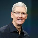 Apple shares close lower on Friday, CEO Cook speaks in favor of more active trade relations with China
