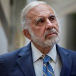 AIG shares gain for a second straight session on Monday, investor Carl Icahn sells his stake in insurer
