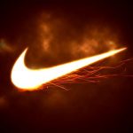 Nike shares close lower on Monday, company to close stores in a number of markets due to COVID-19 illness