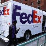 FedEx shares gain for a second straight session on Friday, company will not charge extra fees for most deliveries in peak season
