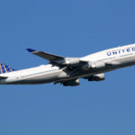 United Airlines shares close lower on Friday, company delays return of some Boeing 777 jets to service until mid-May