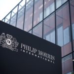Philip Morris shares close higher on Thursday, company says it is working on options to leave Russian market