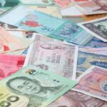 Asian Currencies Edge Lower as Markets Digest U.S. Jobs Data; Rupee Snaps Back from Lows