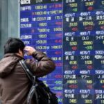 Asian Markets Diverge as Taiwan Tensions Rise and Precious Metals Attract Safe-Haven Flows