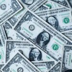 Dollar Softens as Traders Await Key U.S. Jobs Data and Clarify Fed Path