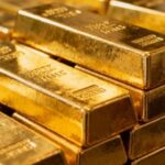 Gold Slides From Record Peak Amid Fed Leadership Jitters