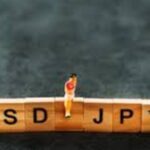 USD/JPY Near Peak as Conflict Risks Meet Policy Paths