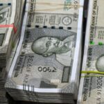 Rupee Slips as RBI Eases Rules; USD/INR Near 93.50