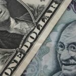 INR Holds Tight as RBI Defends Amid Oil Shock