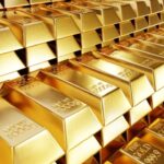 Gold Nears Gains but Strong Dollar Caps Further Upside