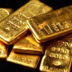 Gold Struggles as Firm Dollar, Fed Outlook Weigh on Prices