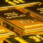 Gold Slides as Inflation Fears Boost Strong Dollar