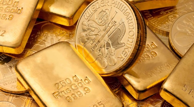 Gold Slides Toward Two-Week Low as Dollar, Fed Bite On