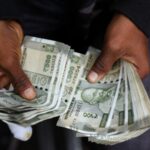 Indian Rupee Steadies as Lower Oil Offsets Dollar Strength