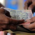 Rupee Gains as Softer Crude and Fed Outlook Weigh on USD/INR