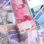 Rupiah Slips as Fed Outlook and Policy Risks Lift USD/IDR