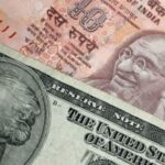 Rupee Softens as Fed Caution and Oil Drop Lift USD/INR