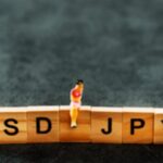 Yen Slides as Rate Gap, Geopolitics Lift USD/JPY