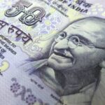 Rupee Steadies as Oil Volatility, Fed Outlook Weigh